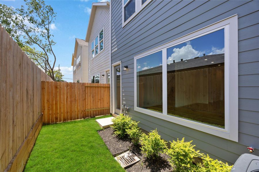 Exterior details and patio area of a home in , Houston (Image 3).