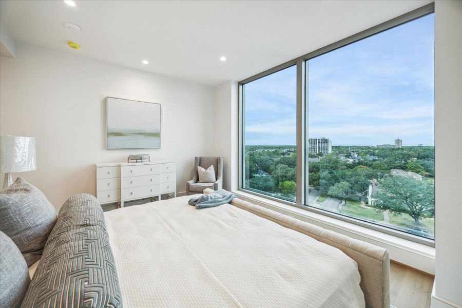 Wake up each morning to this spectacular city skyline Northern views in the primary bedroom retreat. Photos are of a similar unit with the same floor plan Wake up each morning to this spectacular city skyline Northern views in the primary bedroom retreat. Photos are of a similar unit with the same floor plan