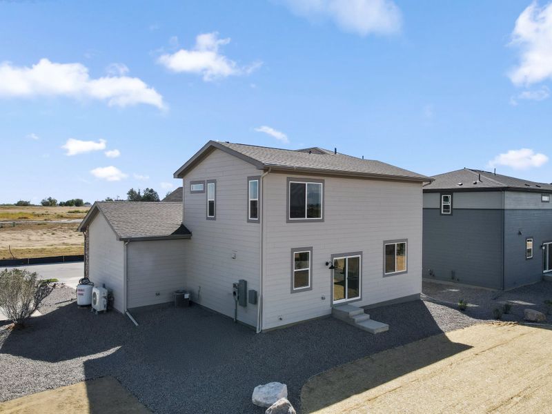 Representative exterior details of a home built from the 3501 by Risewell Homes in Mead Crossing, Mead (Image 3).