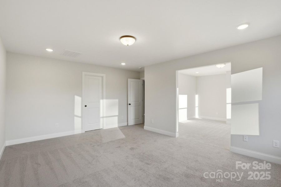 Primary Bedroom and Sitting Room