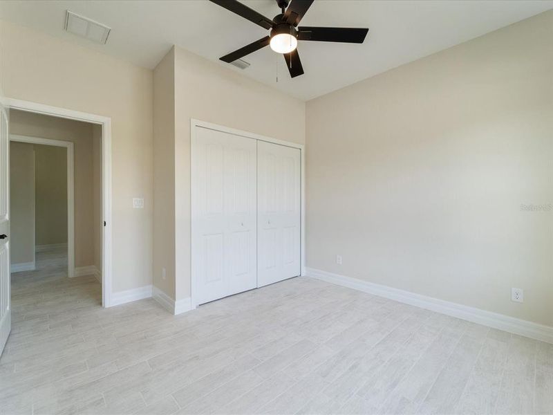 Spacious, unfurnished interior of a new home in , Port Charlotte (Image 11).