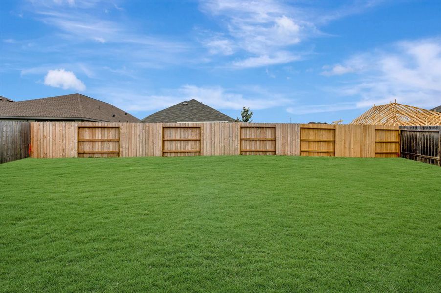 Exterior details and patio area of a home in Magnolia Ridge, Magnolia (Image 21).