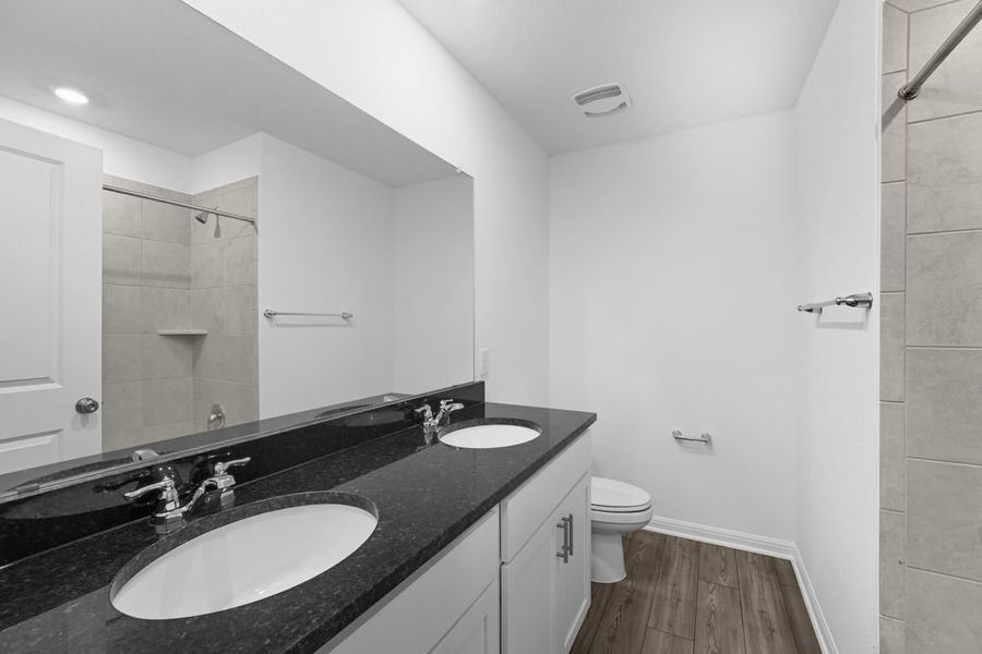 Furnished interior view inside a new home in Longview 40s, Del Valle (Image 7).