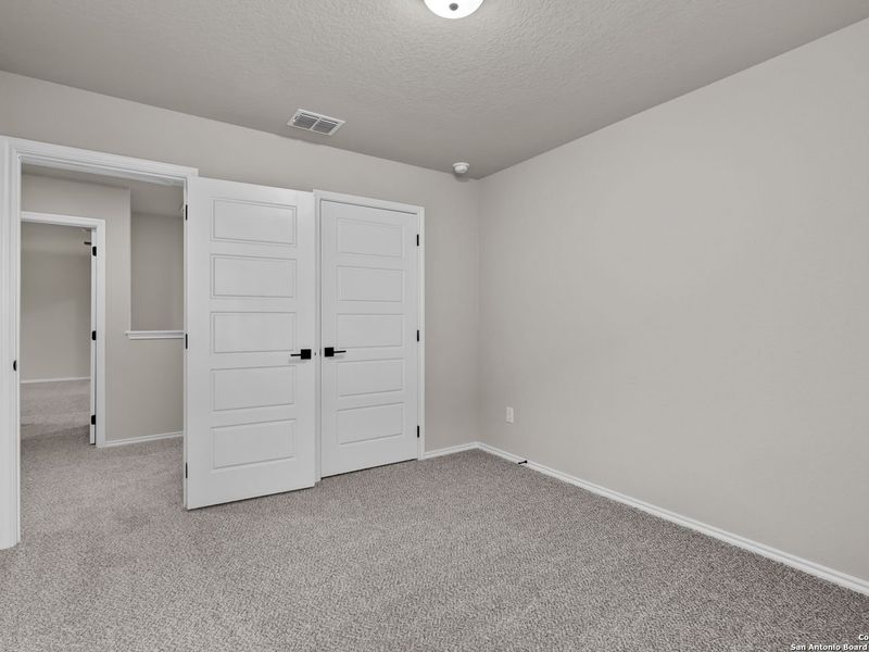 Spacious, unfurnished interior of a new home in Royal Crest, San Antonio (Image 29).