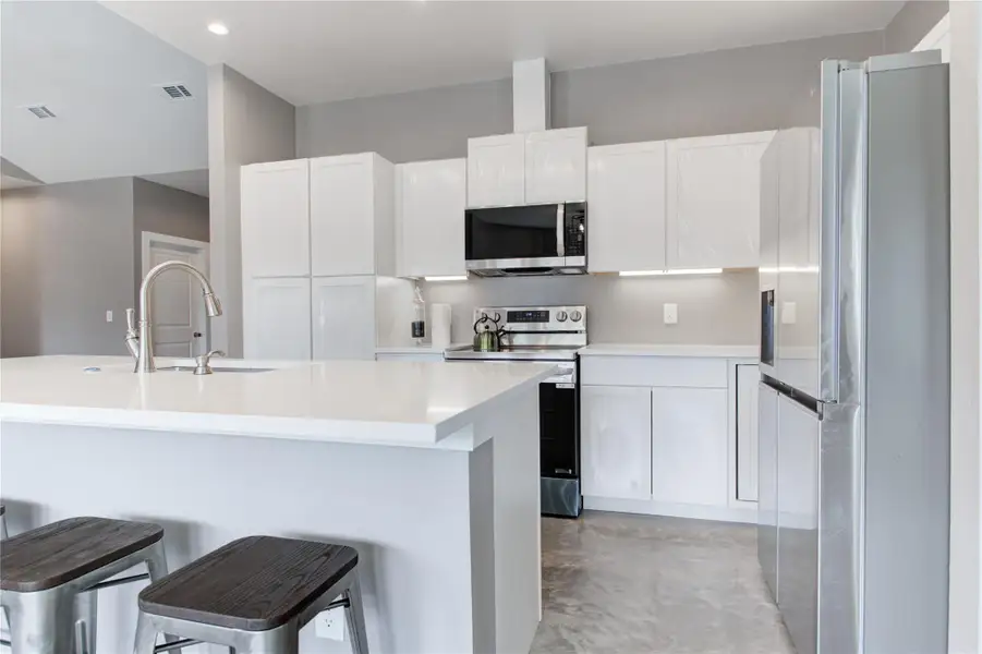 Furnished interior view inside a new home in , Spicewood (Image 5).