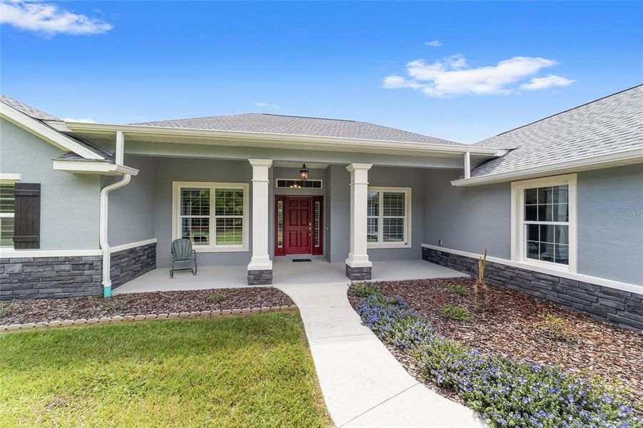 Exterior details and patio area of a home in , Williston (Image 33).