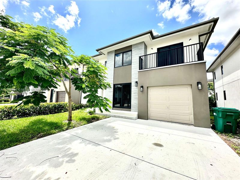 Front exterior of a new home in , Florida City, FL, highlighting curb appeal (Image 15).