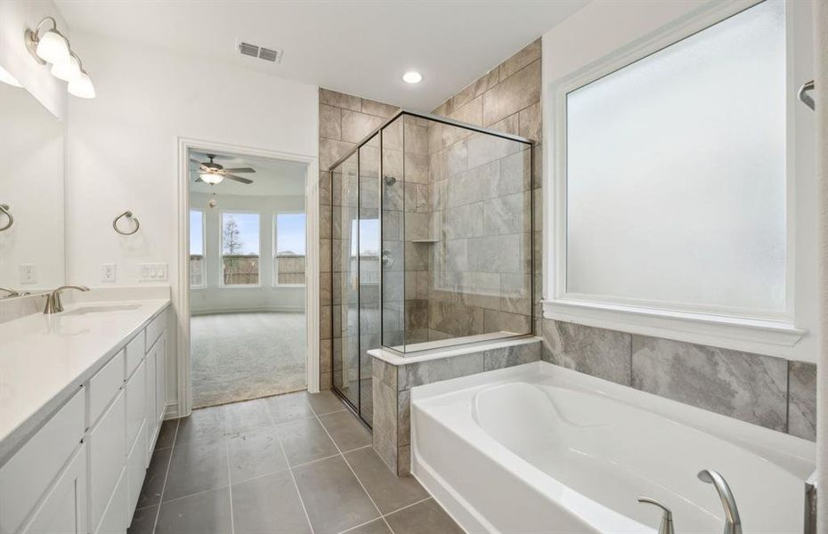 Oversized shower in owner's bathroom*real home pictured