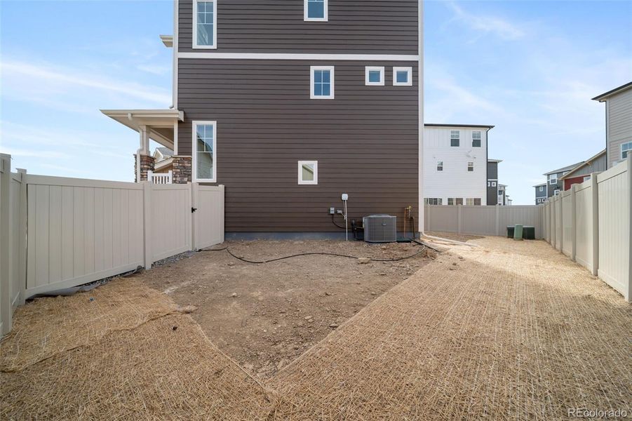 Exterior details and patio area of a home in Erie Highlands, Erie (Image 3).