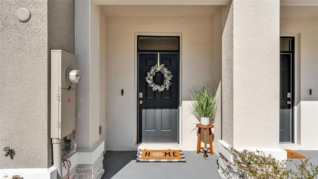 Exterior details and patio area of a home in Farm at Varrea, Plant City (Image 3).