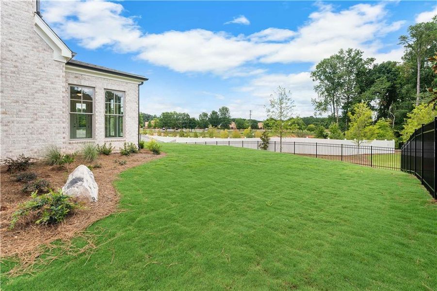 Front exterior of a new home in Knollwood, Johns Creek, GA, highlighting curb appeal (Image 1).