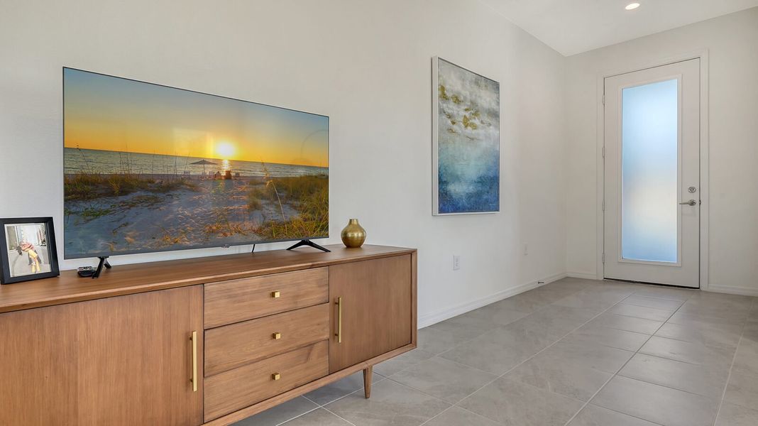 Representative furnished interior of a home built from the Morgan by Neal Communities in Grand Park, Sarasota (Image 11).
