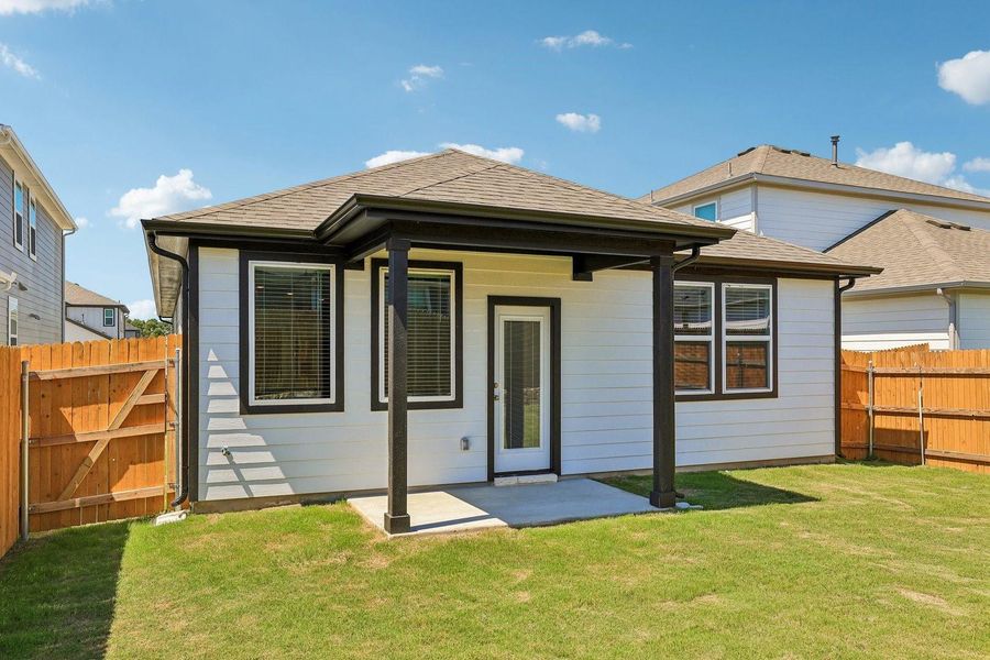 Exterior details and patio area of a home in Trinity Ranch, Elgin (Image 24).