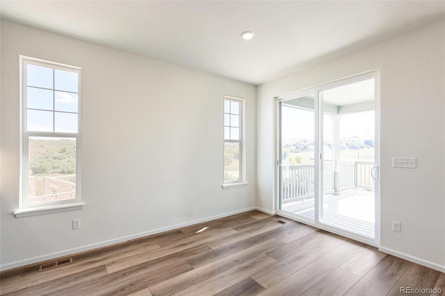 Spacious, unfurnished interior of a new home in Terrain Oak Valley, Castle Rock (Image 32).