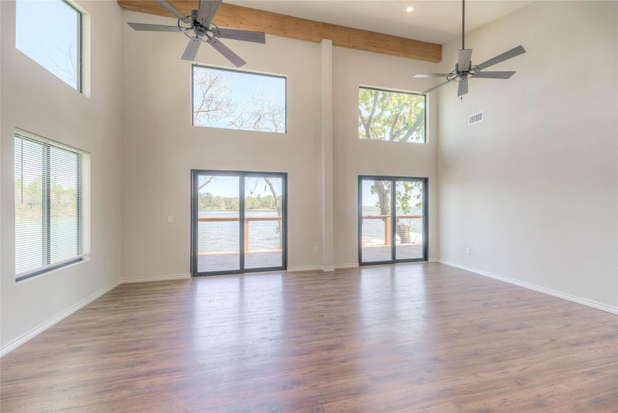 VIEW FROM KITCHEN TO LIVING AREA, HIGH CEILINGS AND THE MILLION DOLLAR VIEW