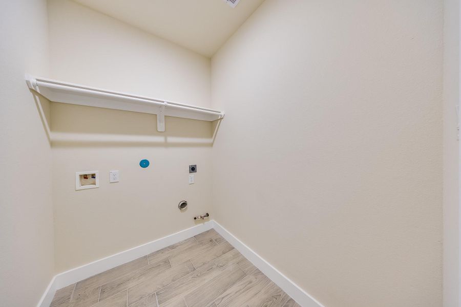 Spacious utility room inside the house, offering practicality and extra storage space. Don’t miss this feature! Spacious utility room inside the house, offering practicality and extra storage space. Don’t miss this feature!