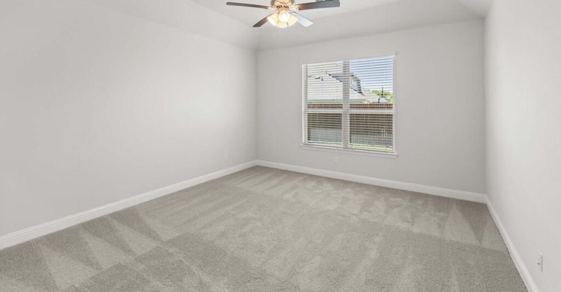 Representative exterior photo of a completed home built from the Goodrich by Impression Homes in Timberbrook, Justin, TX (Image 13).