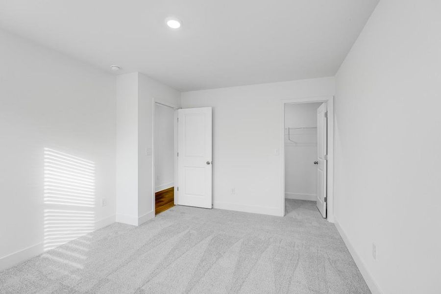 Spacious, unfurnished interior of a new home in Wellington Estates, Madison (Image 34).