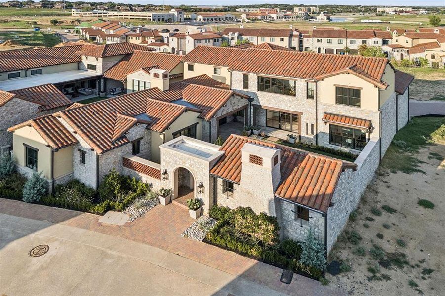 Front exterior of a new home in , Westlake, TX, highlighting curb appeal (Image 2). Front exterior of a new home in , Westlake, TX, highlighting curb appeal (Image 2).