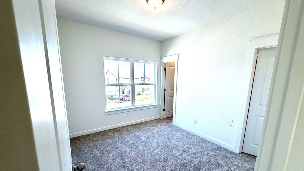 Furnished interior view inside a new home in Flora, Hutto (Image 20).