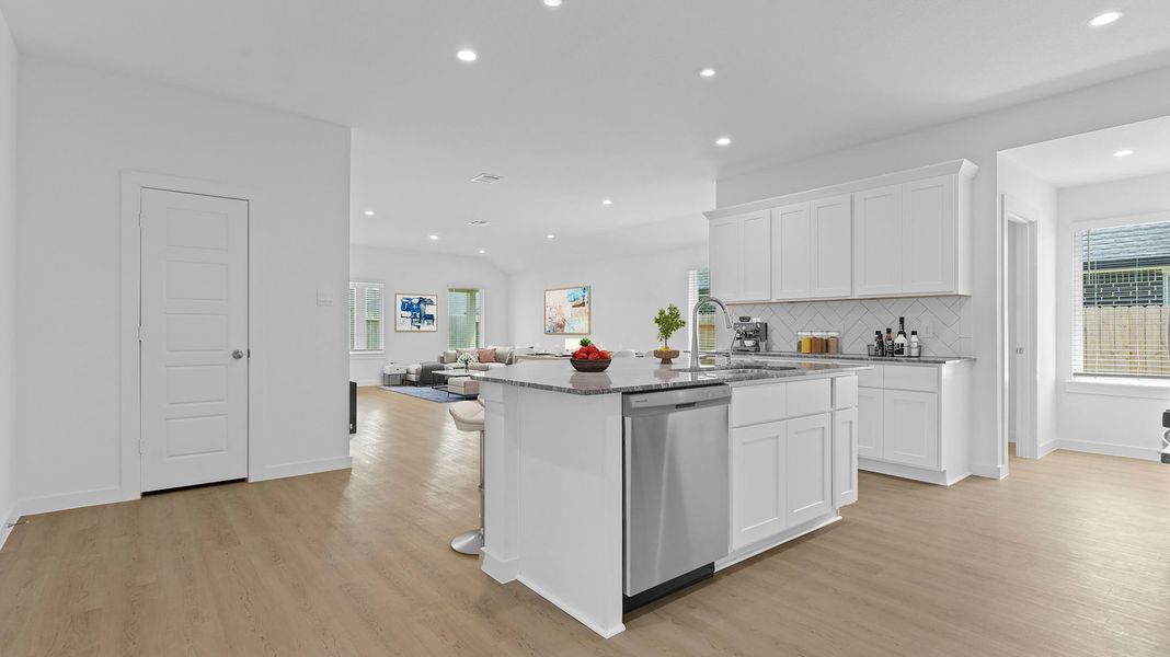 Representative furnished interior of a home built from the Kingston by D.R. Horton in Watermark, Alvin (Image 5).