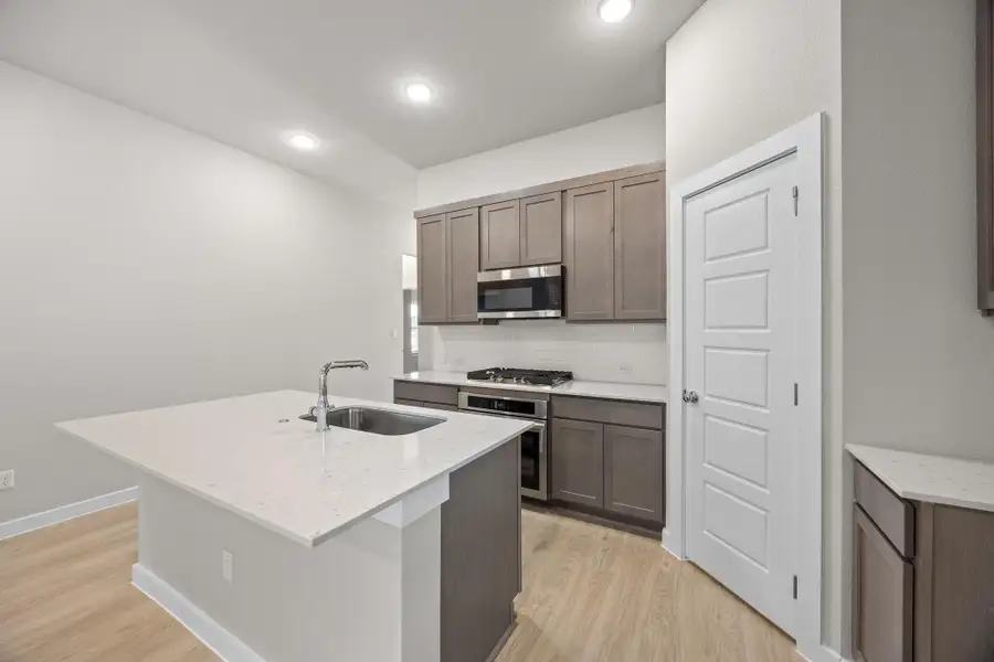 Furnished interior view inside a new home in Lakeside at Tessera, Lago Vista (Image 7).