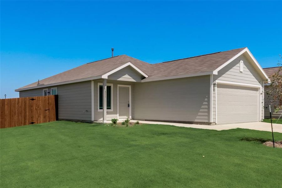 Single story home with an attached garage, driveway, and a shingled roof Single story home with an attached garage, driveway, and a shingled roof