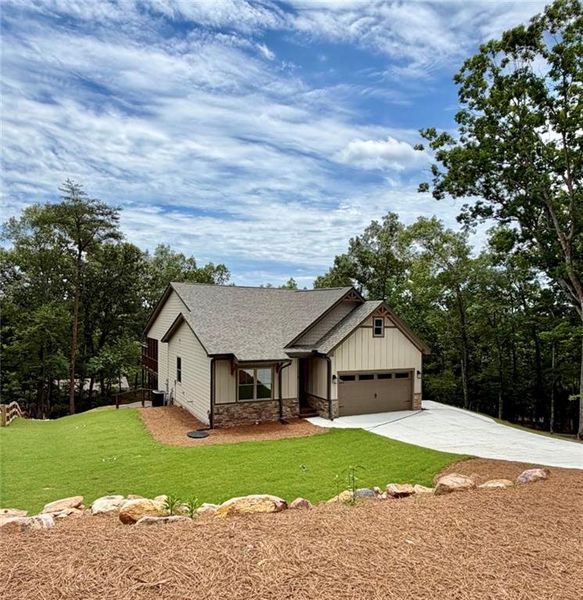 Front exterior of a new home in , Waleska, GA, highlighting curb appeal (Image 2). Front exterior of a new home in , Waleska, GA, highlighting curb appeal (Image 2).