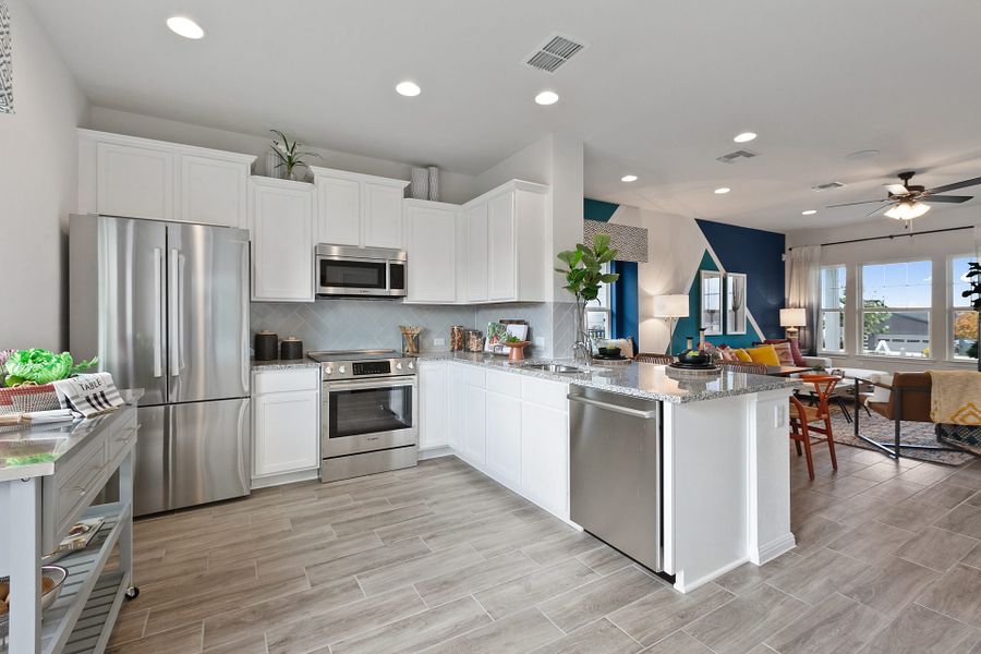 Furnished interior view inside a new home in Whisper Valley, Manor (Image 14).