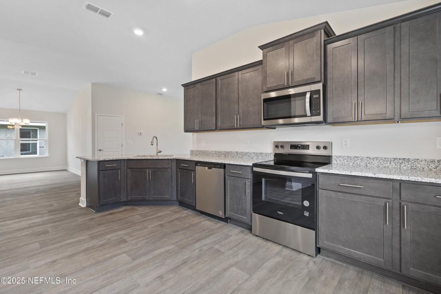Furnished interior view inside a new home in Shadow Crest at Rolling Hills, Green Cove Springs (Image 3).