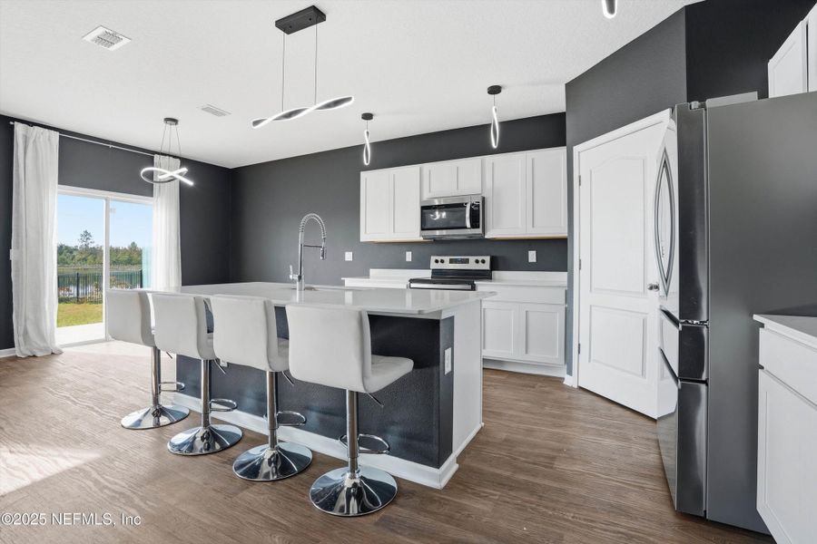 Furnished interior view inside a new home in Sawmill Branch Express, Palm Coast (Image 13). Furnished interior view inside a new home in Sawmill Branch Express, Palm Coast (Image 13).