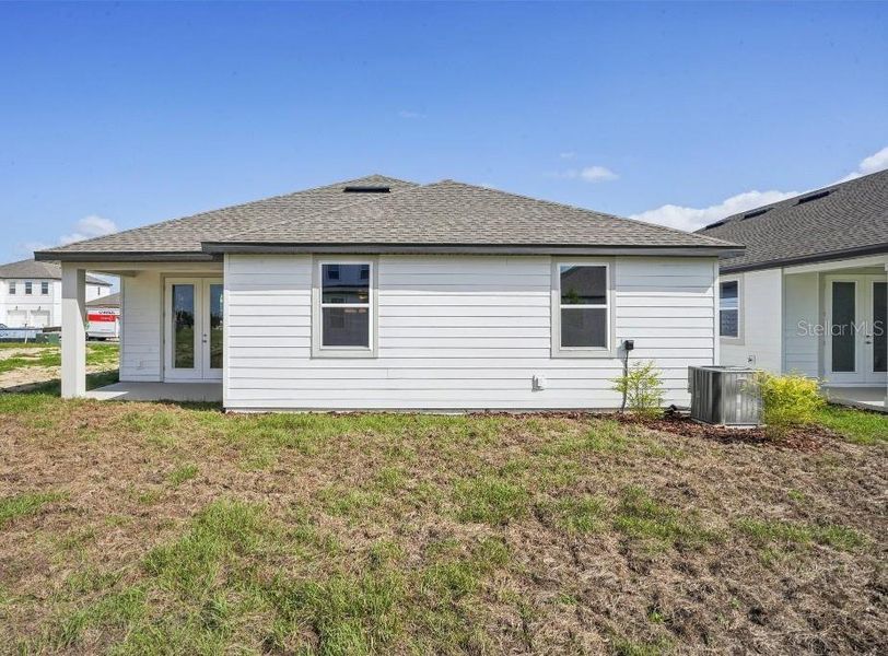 Exterior details and patio area of a home in Trailside, Mount Dora (Image 15). Exterior details and patio area of a home in Trailside, Mount Dora (Image 15).