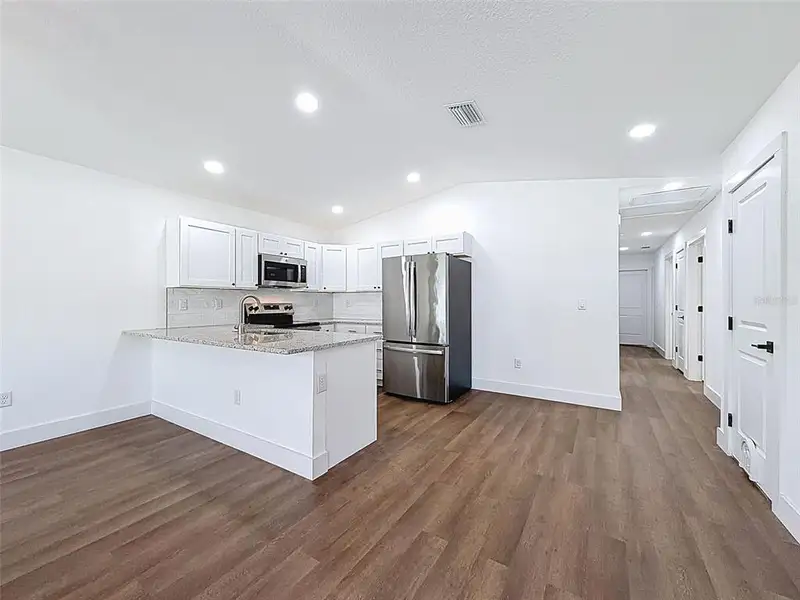 Furnished interior view inside a new home in , Weeki Wachee (Image 7).