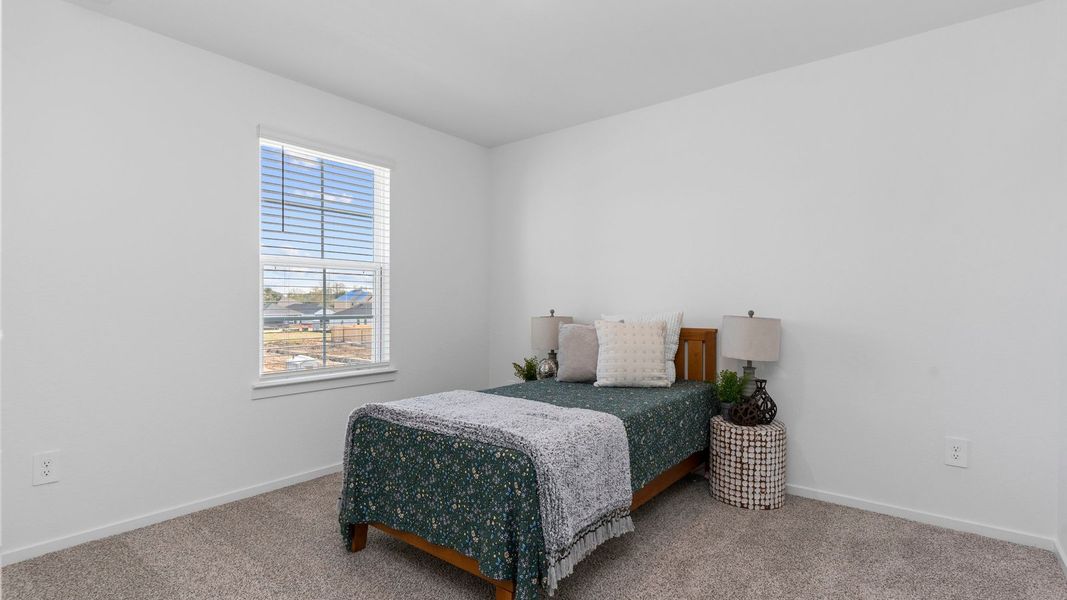 Representative furnished interior of a home built from the FLORENCE by D.R. Horton in Lakes at Westland Ranch, League City (Image 21).