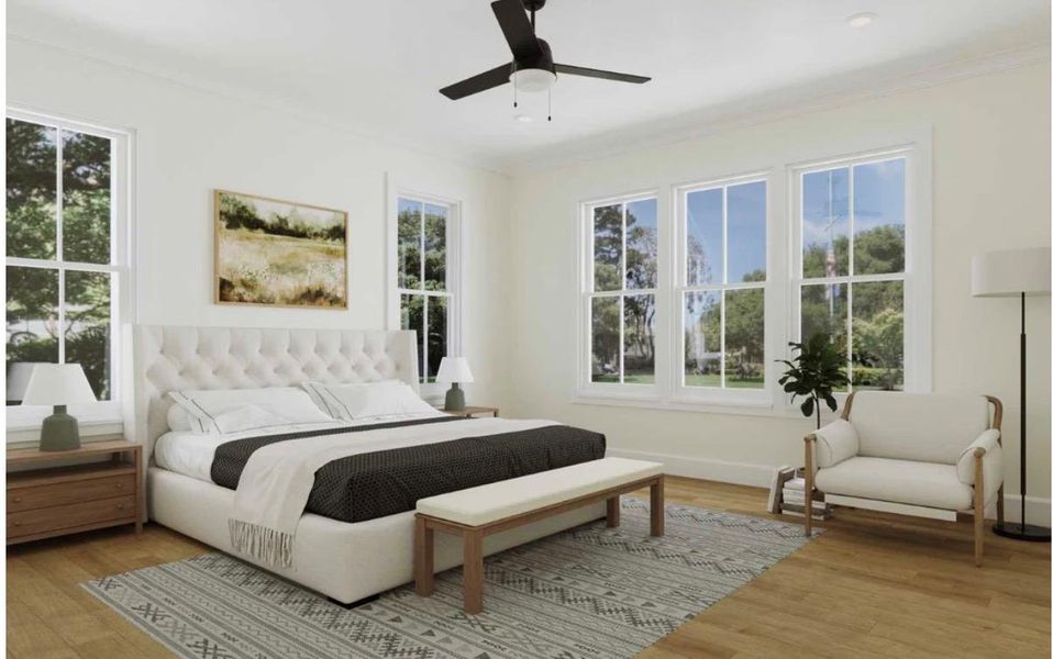 Well-lit sleeping quarters with bright windows and a ceiling fan provide a comfortable retreat.