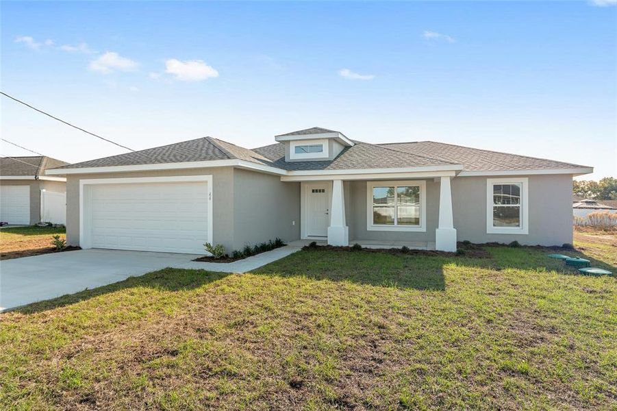 Front exterior of a new home in , Ocala, FL, highlighting curb appeal (Image 27). Front exterior of a new home in , Ocala, FL, highlighting curb appeal (Image 27).