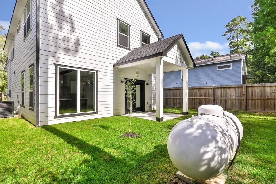 Exterior details and patio area of a home in , Houston (Image 3).