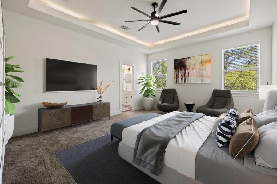 Bedroom with a raised ceiling, carpet floors, ensuite bath, and a ceiling fan Bedroom with a raised ceiling, carpet floors, ensuite bath, and a ceiling fan