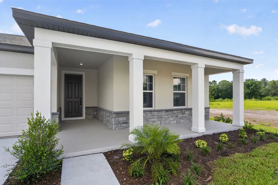 Exterior details and patio area of a home in Tyson Reserve, St. Cloud (Image 3).