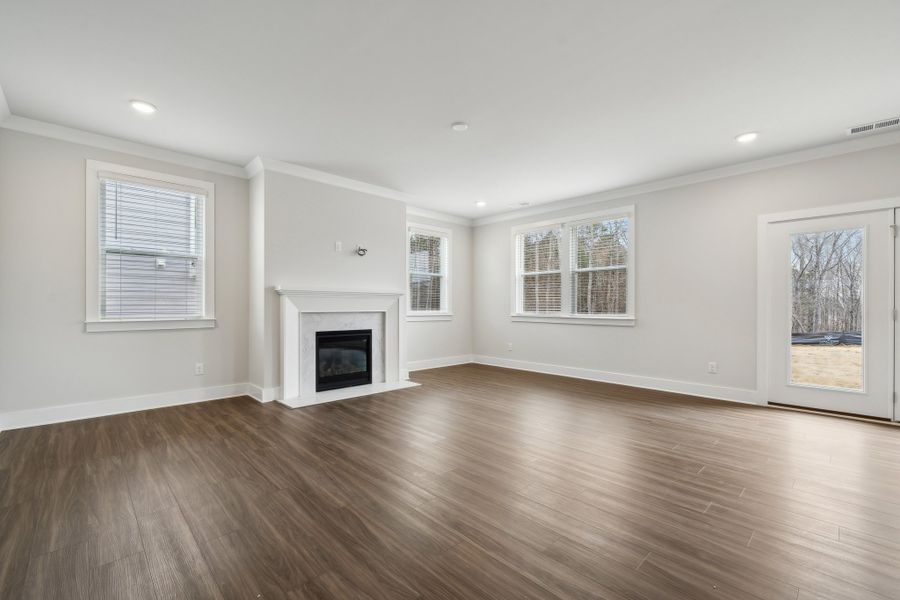 A large empty living room. A large empty living room.