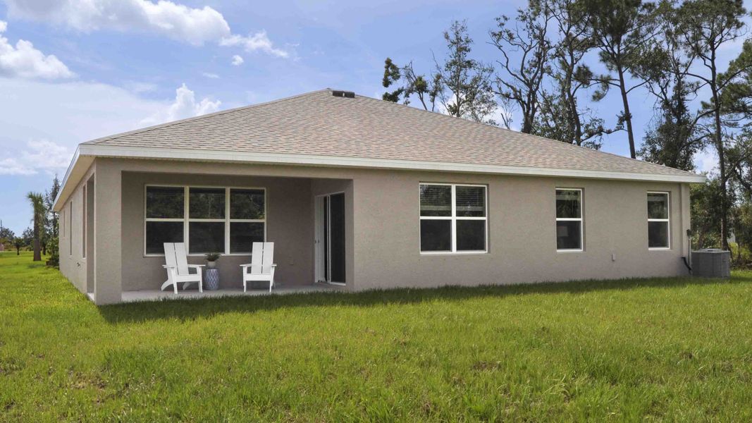 Representative exterior photo of a completed home built from the Denham by D.R. Horton in Oakfield Lakes, Parrish, FL (Image 6). Representative exterior photo of a completed home built from the Denham by D.R. Horton in Oakfield Lakes, Parrish, FL (Image 6).