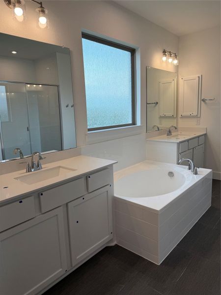 Primary Bath retreat with dual vanities & garden tub Primary Bath retreat with dual vanities & garden tub