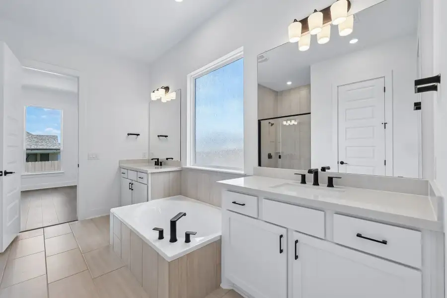 Representative furnished interior of a home built from the Guadalupe by Taylor Morrison in Eastwood, Manor (Image 17).
