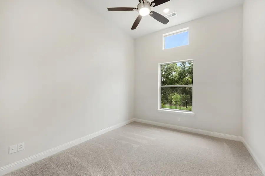Spacious, unfurnished interior of a new home in Cottonwood Creek, Rowlett (Image 43).