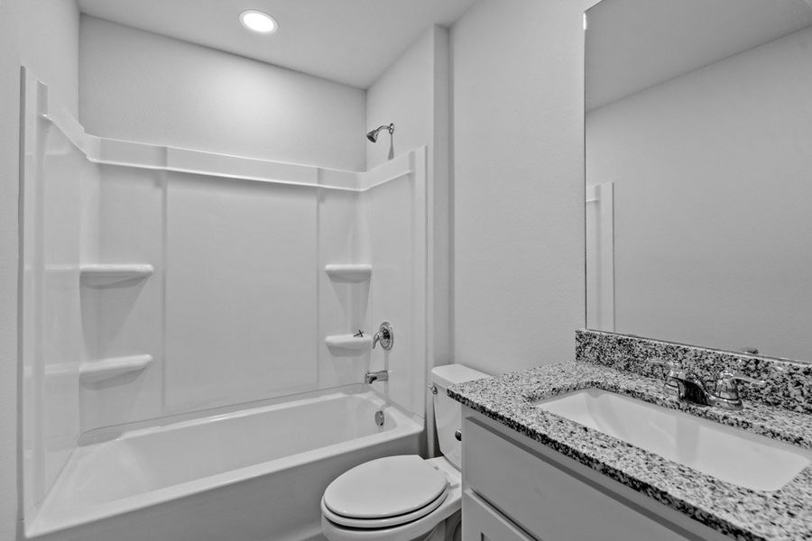 Representative furnished interior of a home built from the KINGSTON by D.R. Horton in Faculty Row, Abilene (Image 12).