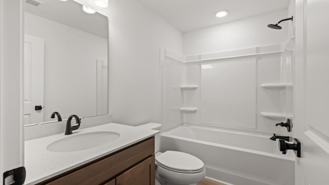 Furnished interior view inside a new home in Creekside at Andrews, Summerville (Image 13).