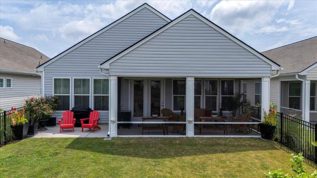 Front exterior of a new home in K. Hovnanian's® Four Seasons at Lakes of Cane Bay, Summerville, SC, highlighting curb appeal (Image 21).