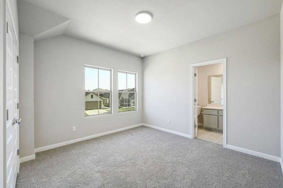 Bedroom in the Willow home plan by Trophy Signature Homes – REPRESENTATIVE PHOTO