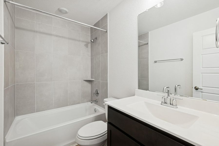 Furnished interior view inside a new home in Lone Star Landing, Montgomery (Image 7).