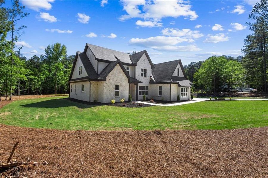 Front exterior of a new home in , Hull, GA, highlighting curb appeal (Image 32).